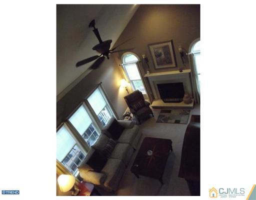1 Cutter Court Cream Ridge, NJ 08514 - Photo 14 of 25 a living room with furniture and a fireplace