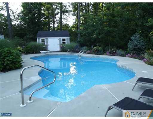 1 Cutter Court Cream Ridge, NJ 08514 - Photo 5 of 25 a view of a swimming pool with a patio