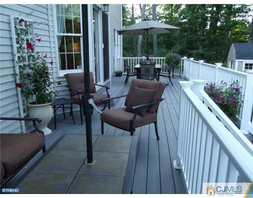 1 Cutter Court Cream Ridge, NJ 08514 - Photo 6 of 25 a view of balcony with chairs and potted plants