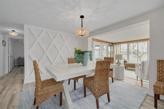 a dining room with furniture window wooden floor