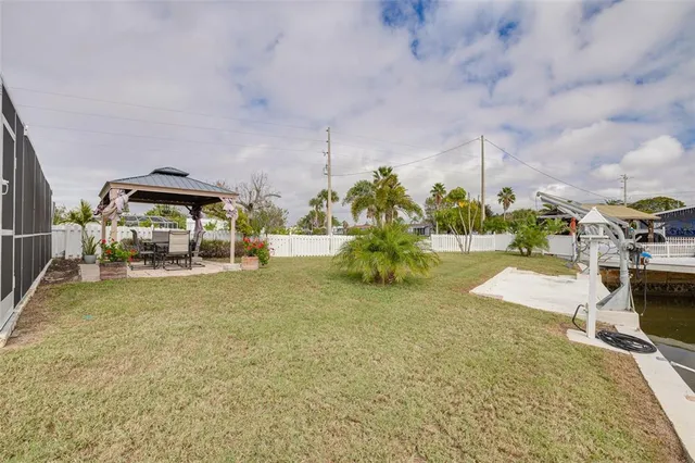 a view of yard with swimming pool