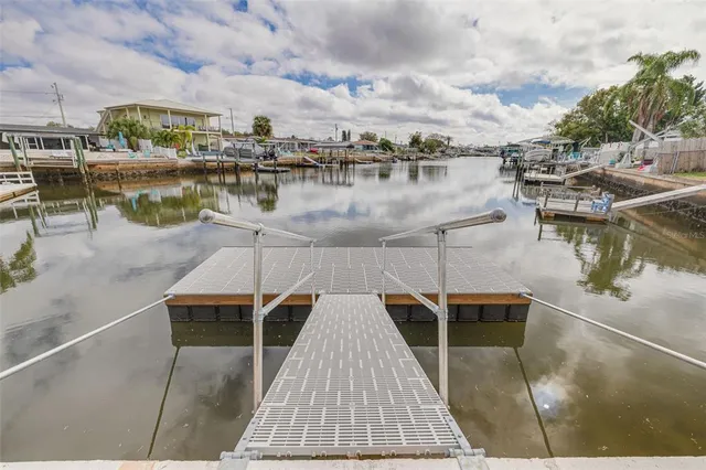 a view of a house with a yard and garage