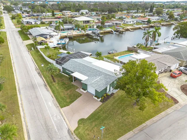 view of a lake with outdoor seating