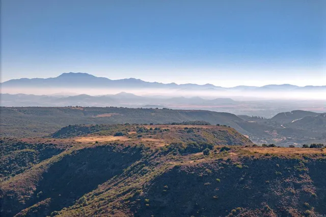 a view of city and mountain