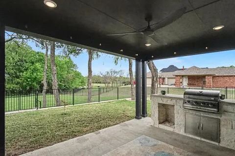 a view of a garage with parked cars