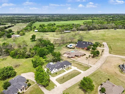 a view of a house with a big yard
