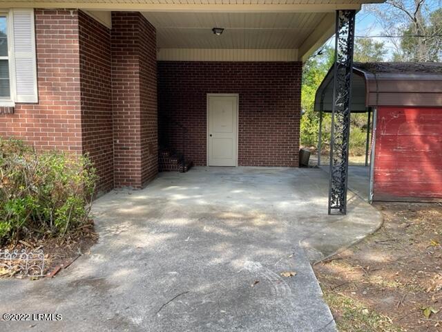 1 State Rd S-7-428 Beaufort, SC 29907 - Photo 12 of 43 door to utility room