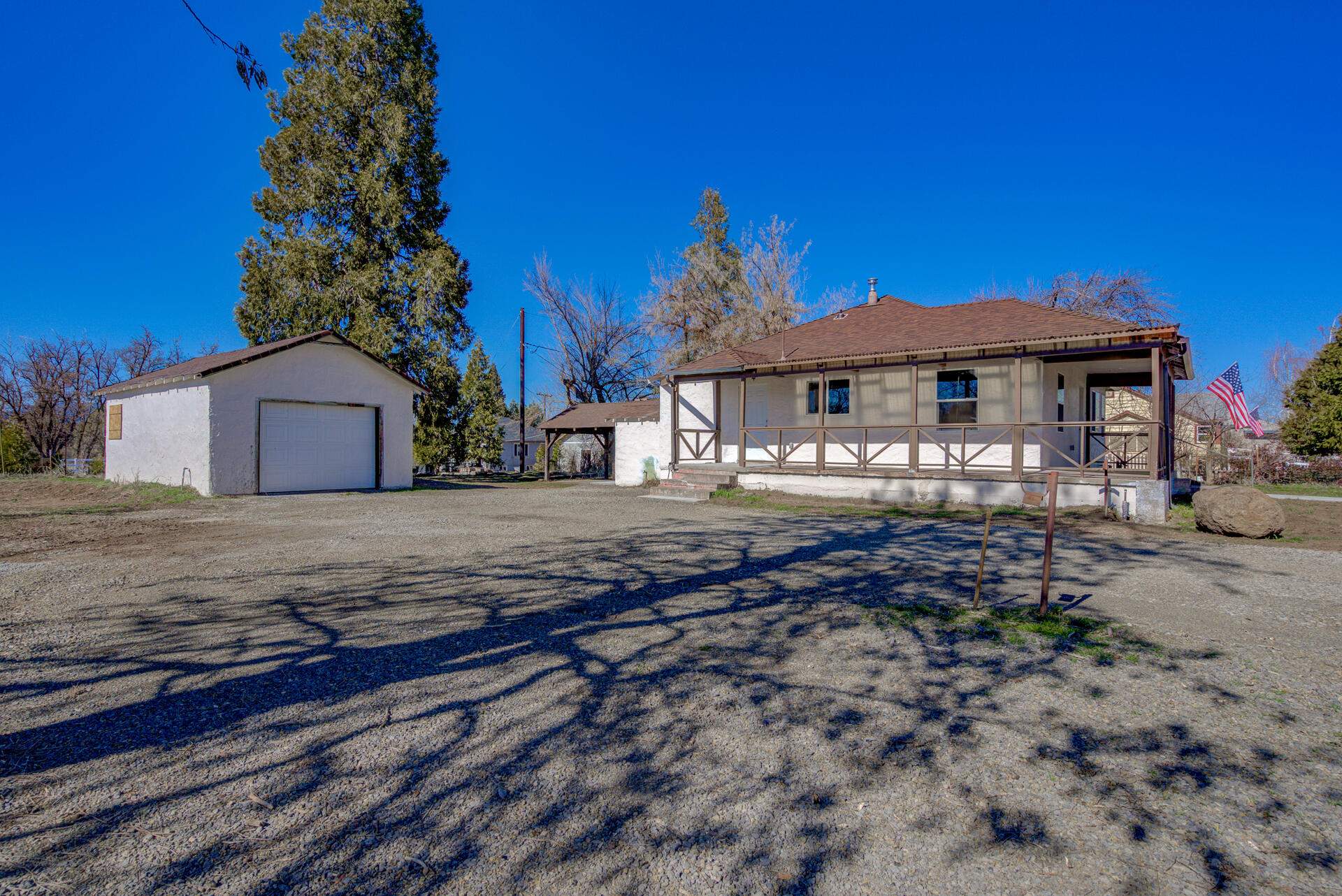 43222 State Highway Fall River Mills, CA 96028 - Photo 2 of 38 a front view of a house with a yard