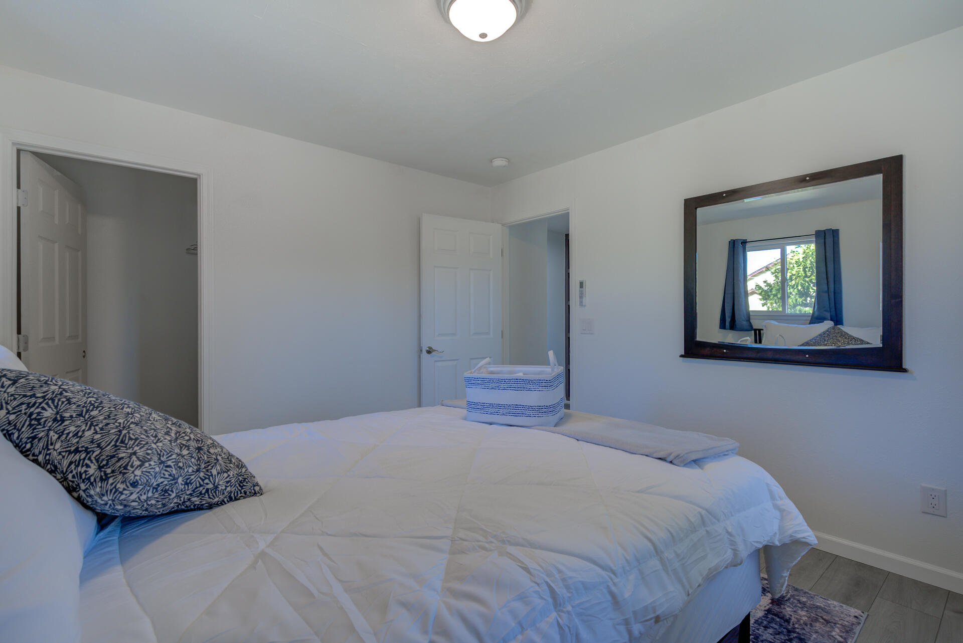 43222 State Highway Fall River Mills, CA 96028 - Photo 22 of 38 a bedroom with a bed and a lamp