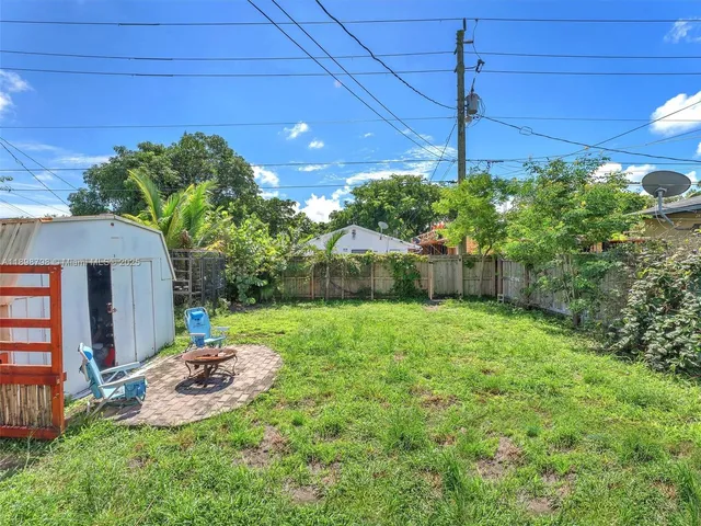 a view of a backyard with a garden
