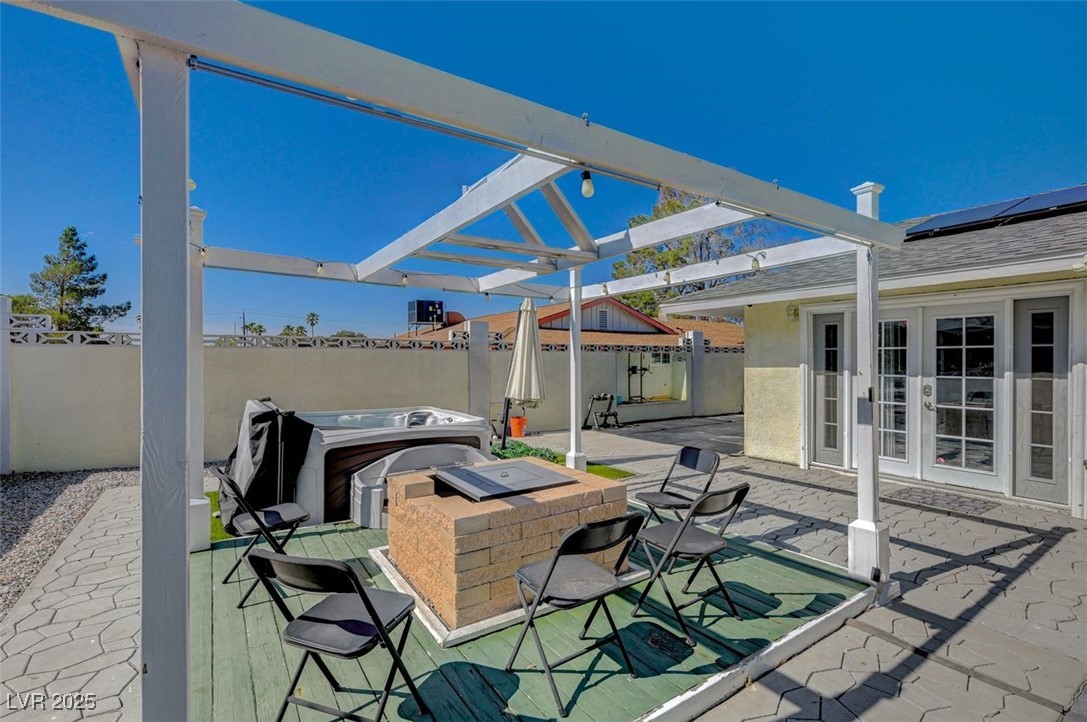 5248 Rambling Road Las Vegas, NV 89120 - Photo 19 of 35 View of patio with a pergola, french doors, area for grilling, and a hot tub