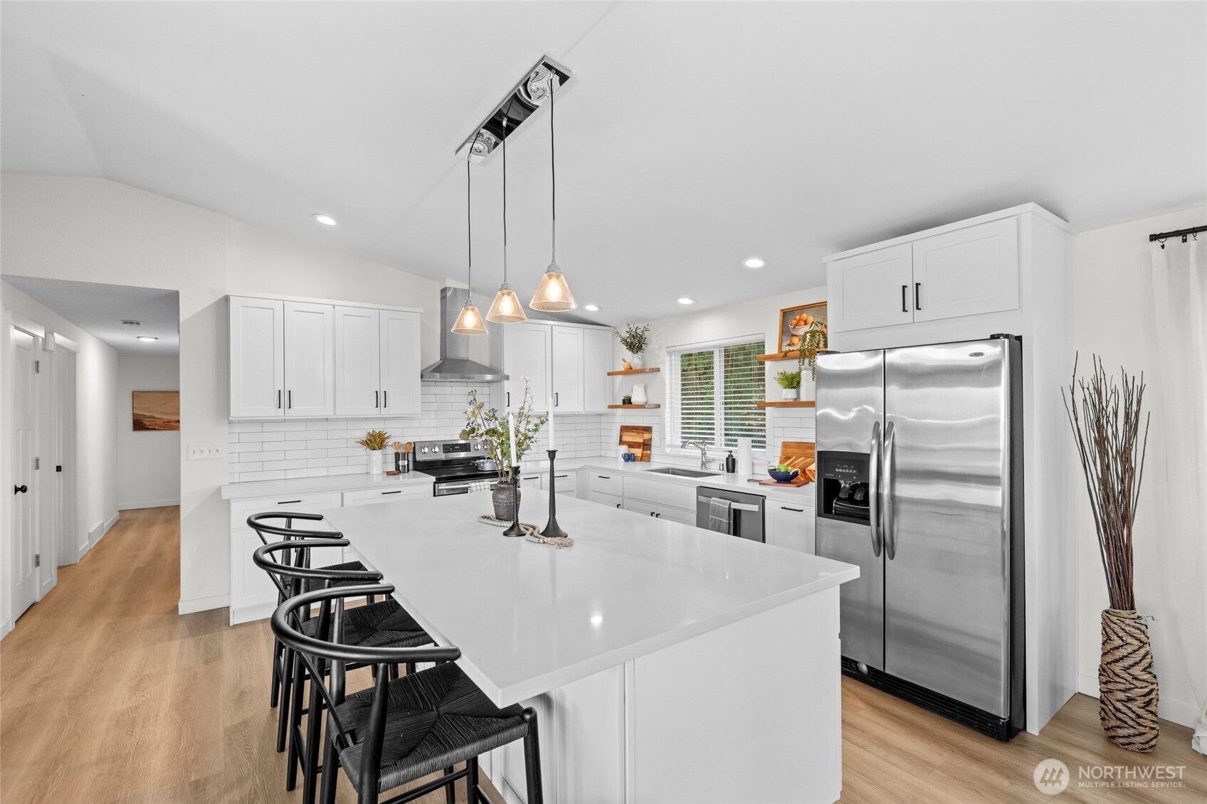 30013 2nd Avenue Southwest Federal Way, WA 98023 - Photo 11 of 40 a kitchen with refrigerator cabinets and wooden floor