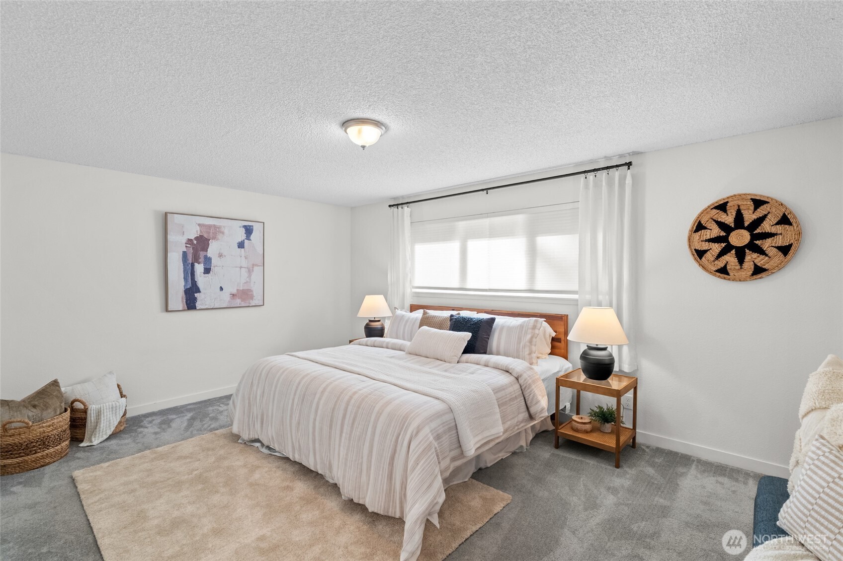 30013 2nd Avenue Southwest Federal Way, WA 98023 - Photo 17 of 40 a bedroom with a bed and a painting on the wall