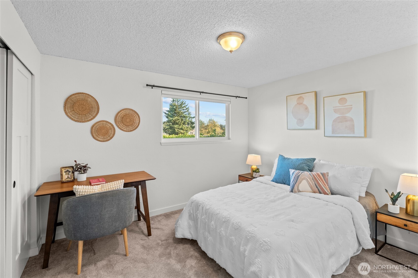 30013 2nd Avenue Southwest Federal Way, WA 98023 - Photo 22 of 40 a bedroom with a bed and cabinets