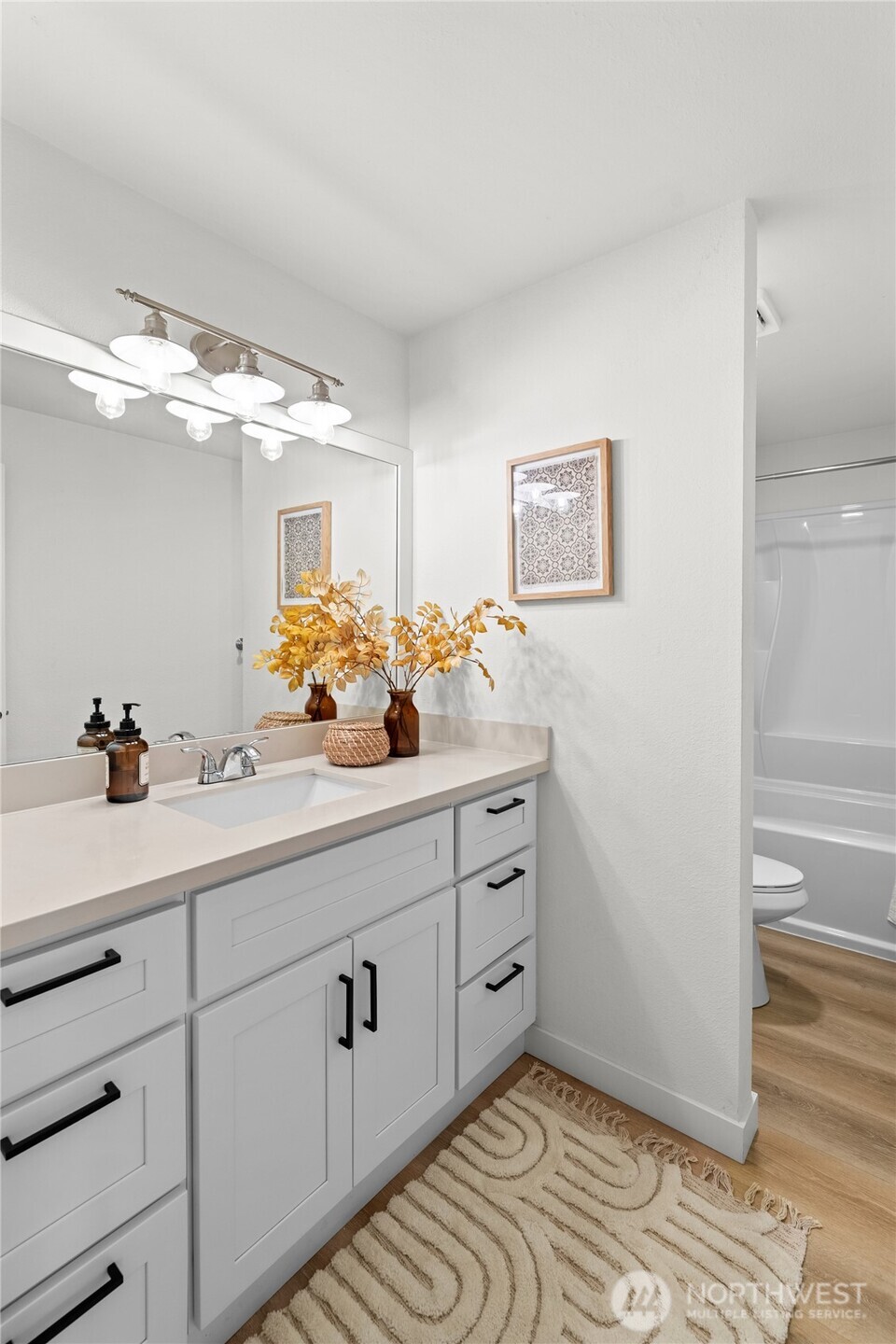 30013 2nd Avenue Southwest Federal Way, WA 98023 - Photo 23 of 40 a bathroom with a sink and a mirror