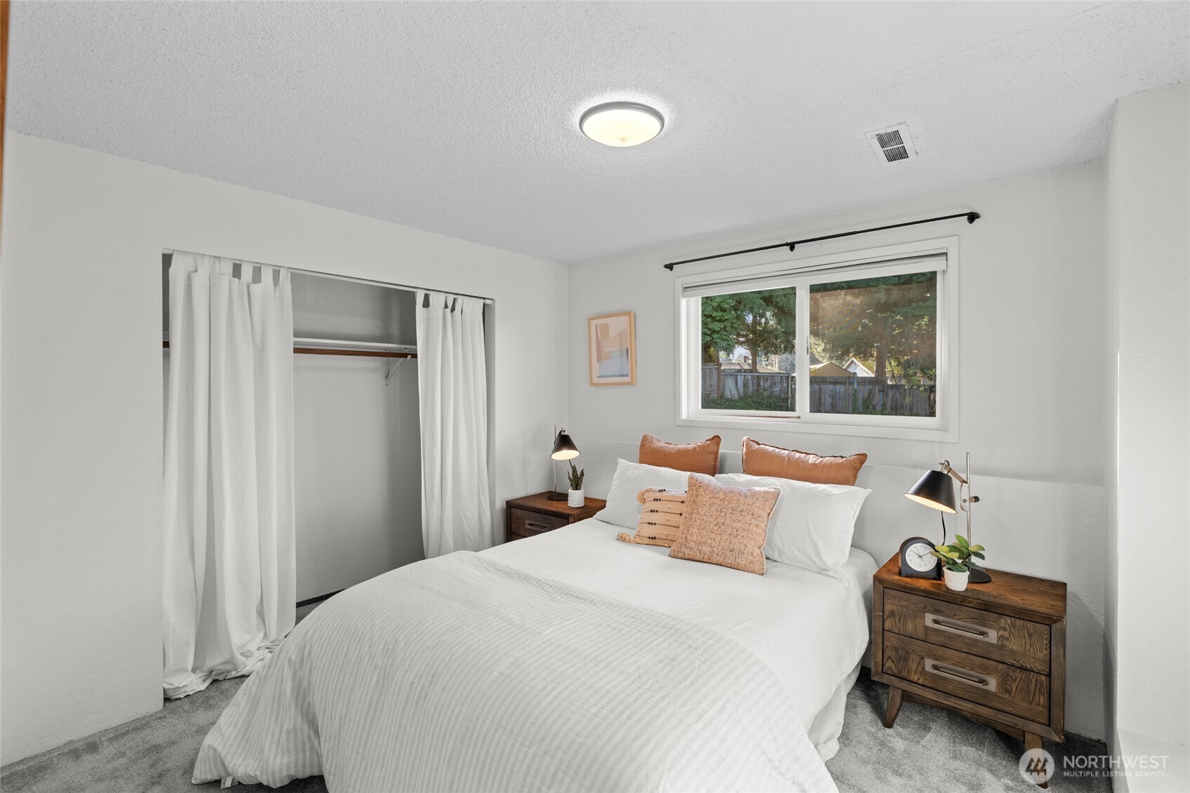 30013 2nd Avenue Southwest Federal Way, WA 98023 - Photo 32 of 40 a bedroom with a bed and wooden floor