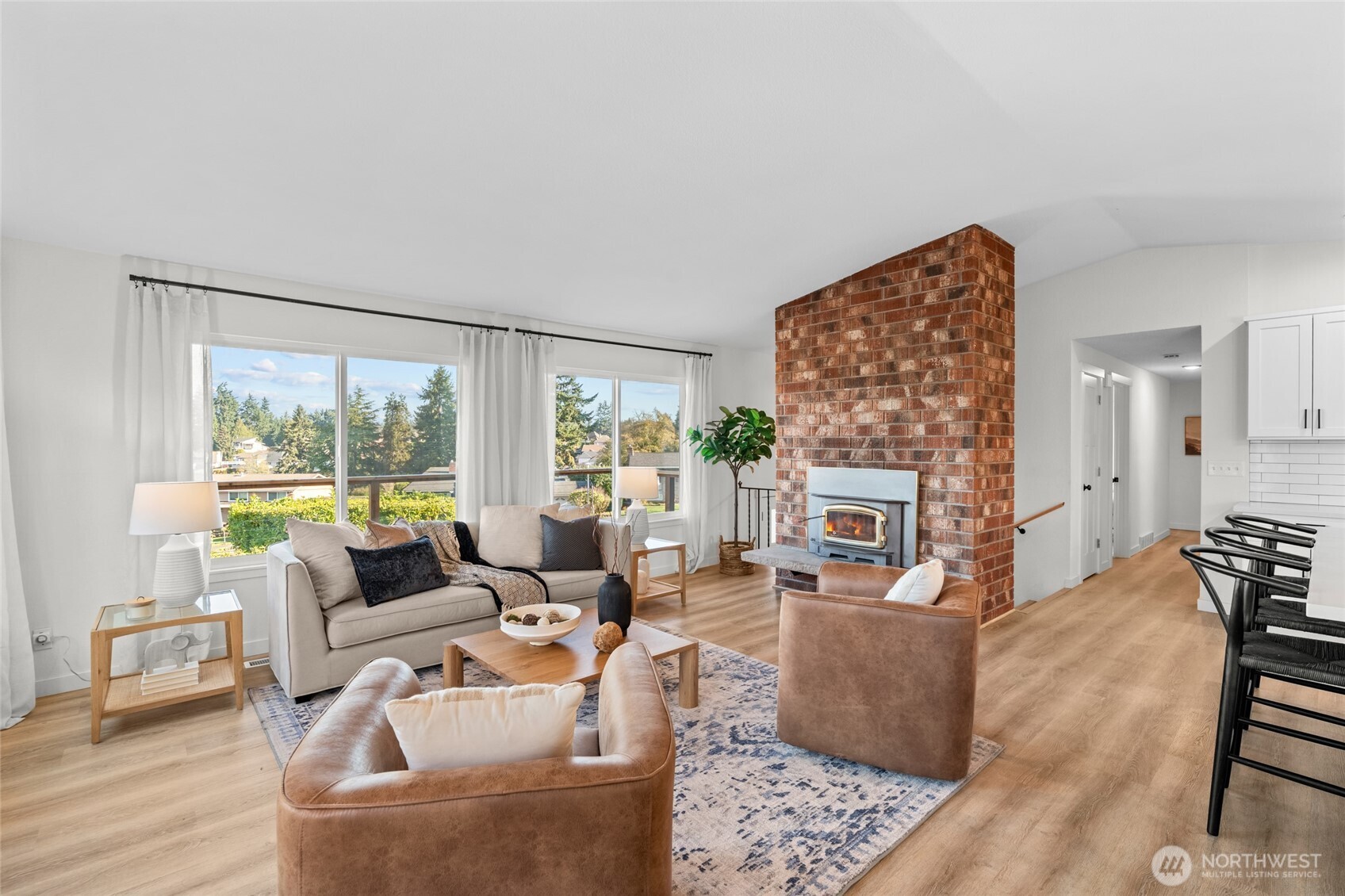 30013 2nd Avenue Southwest Federal Way, WA 98023 - Photo 7 of 40 a living room with fireplace furniture and a large window