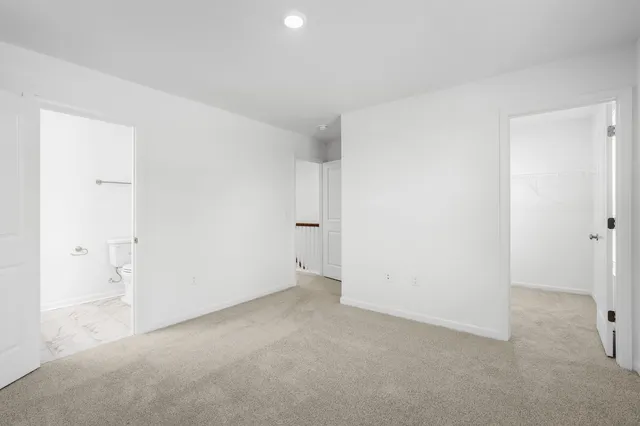 a view of a bathroom with a sink and a mirror