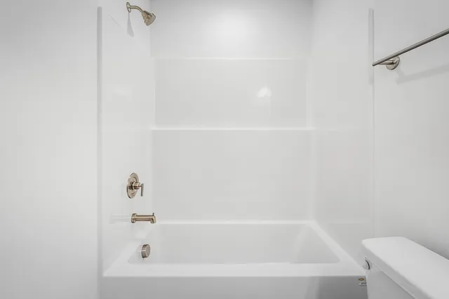 a front view of a building with windows