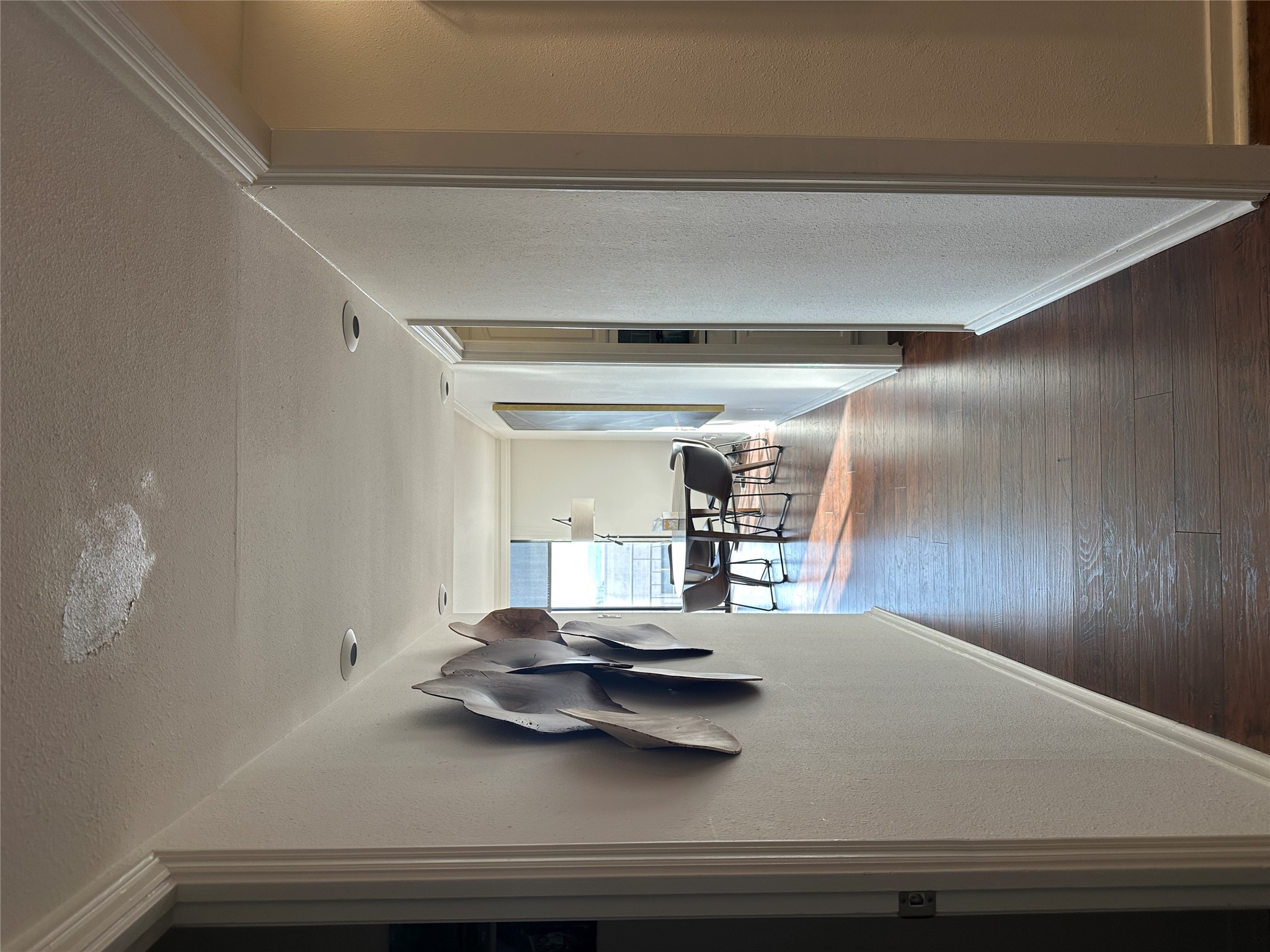 1122 Colorado Street, Unit 1609 Austin, TX 78701 - Photo 24 of 29 a hallway with hardwood floor and furniture