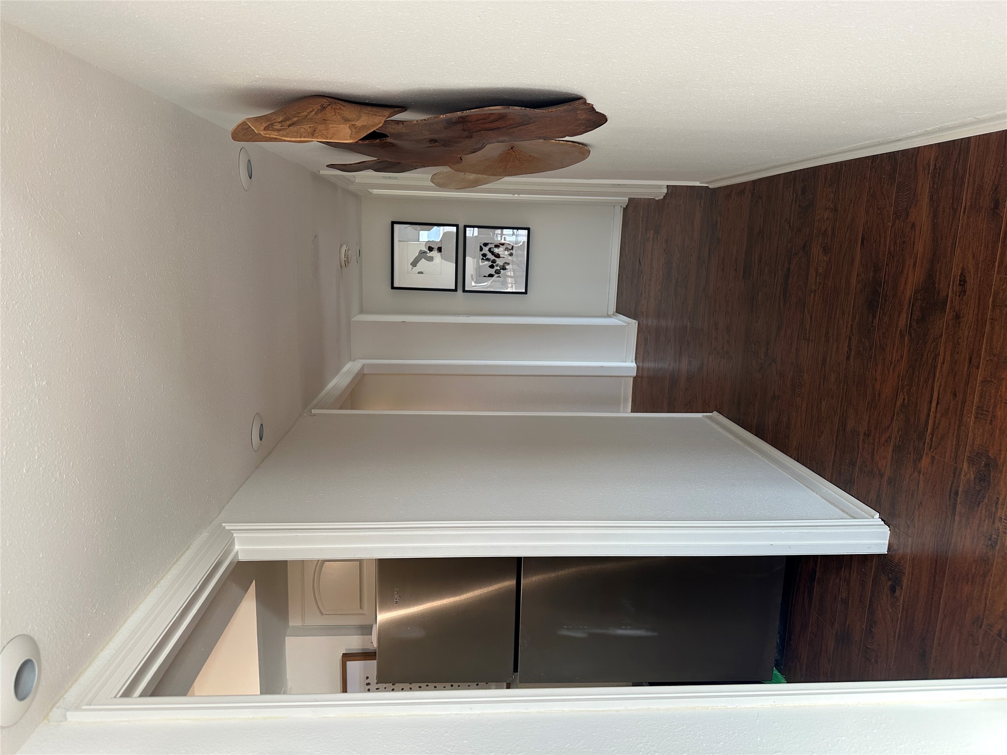 1122 Colorado Street, Unit 1609 Austin, TX 78701 - Photo 25 of 29 a view of a hallway with wooden floor and closet