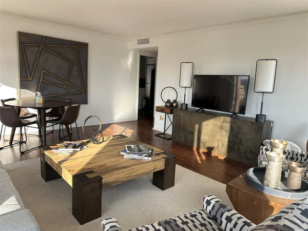 a room with furniture and a flat screen tv