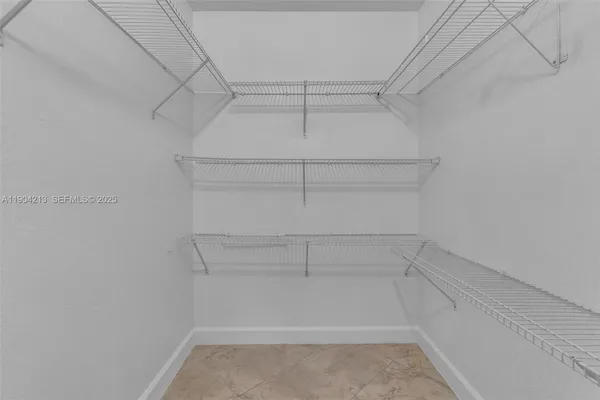 a empty closet with white paint