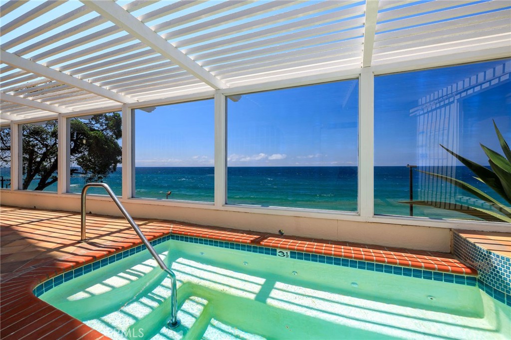 565 Esplanade, Unit 312 Redondo Beach, CA 90277 - Photo 25 of 32 a view of a backyard with a swimming pool