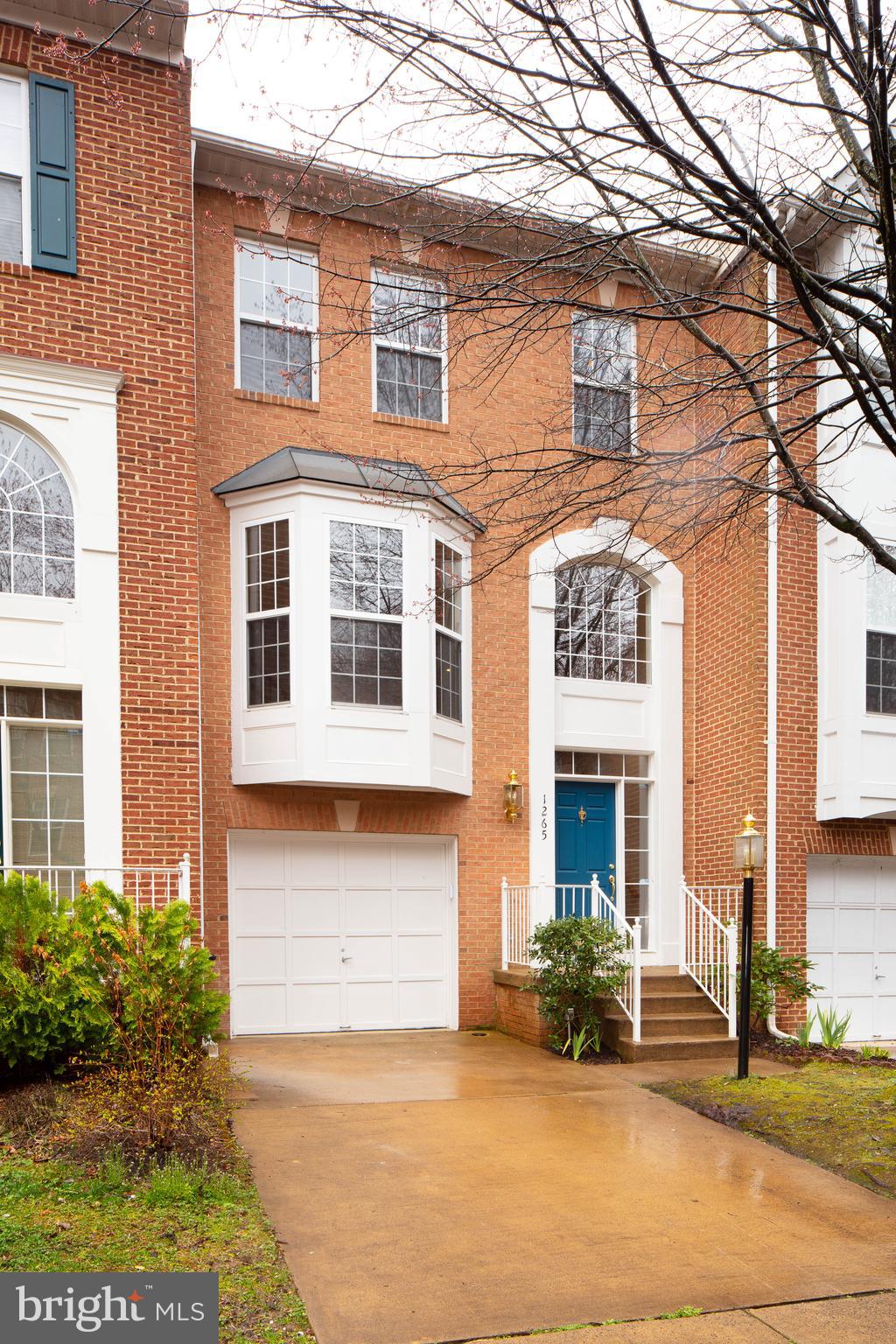 1265 Wild Hawthorn Way Reston, VA 20194 - Photo 1 of 56 Beautiful Brick Front Townhouse in North Reston