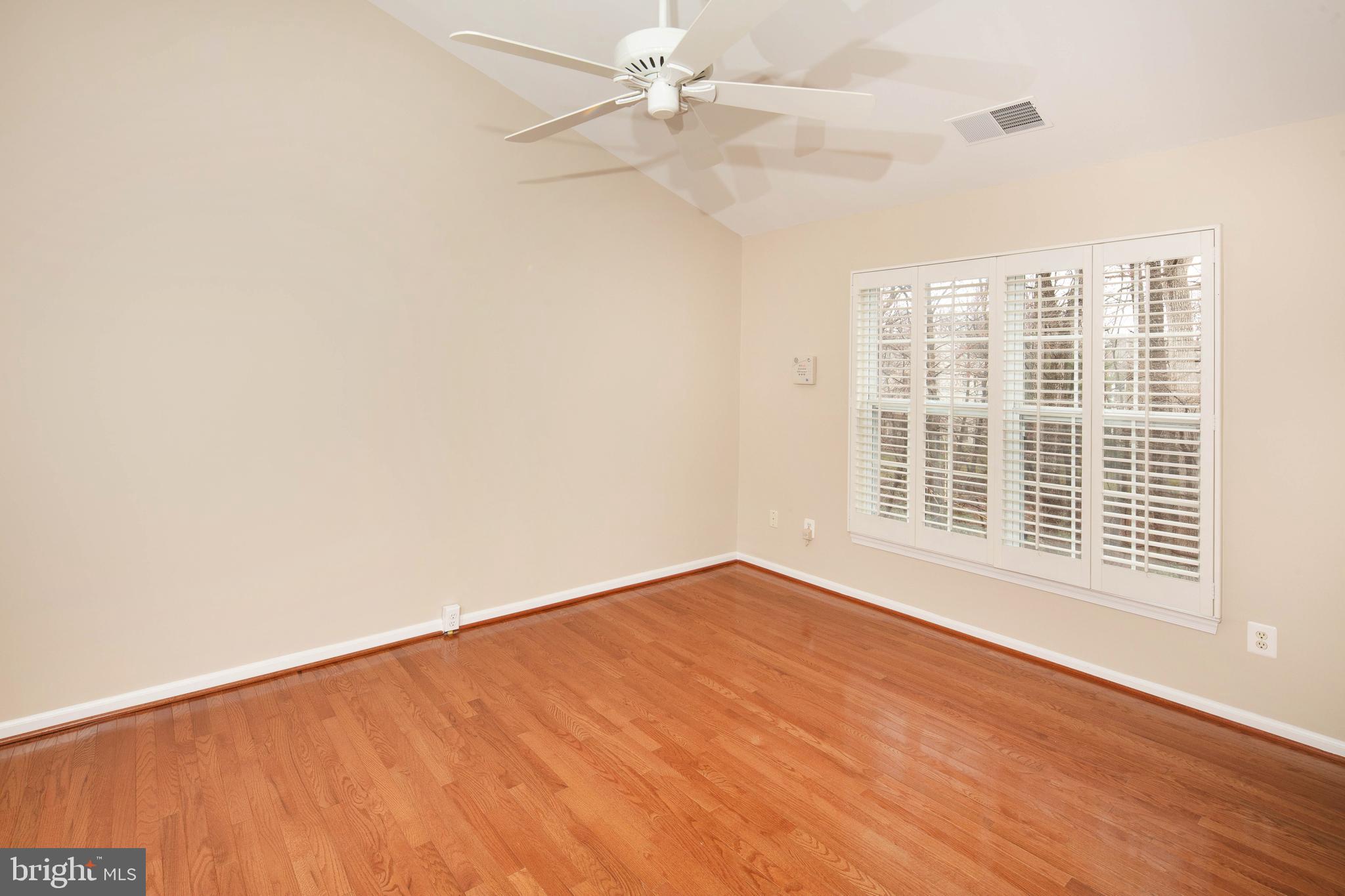 1265 Wild Hawthorn Way Reston, VA 20194 - Photo 29 of 56 Primary Bedroom w/ Wood Floor & Cathedral Ceiling