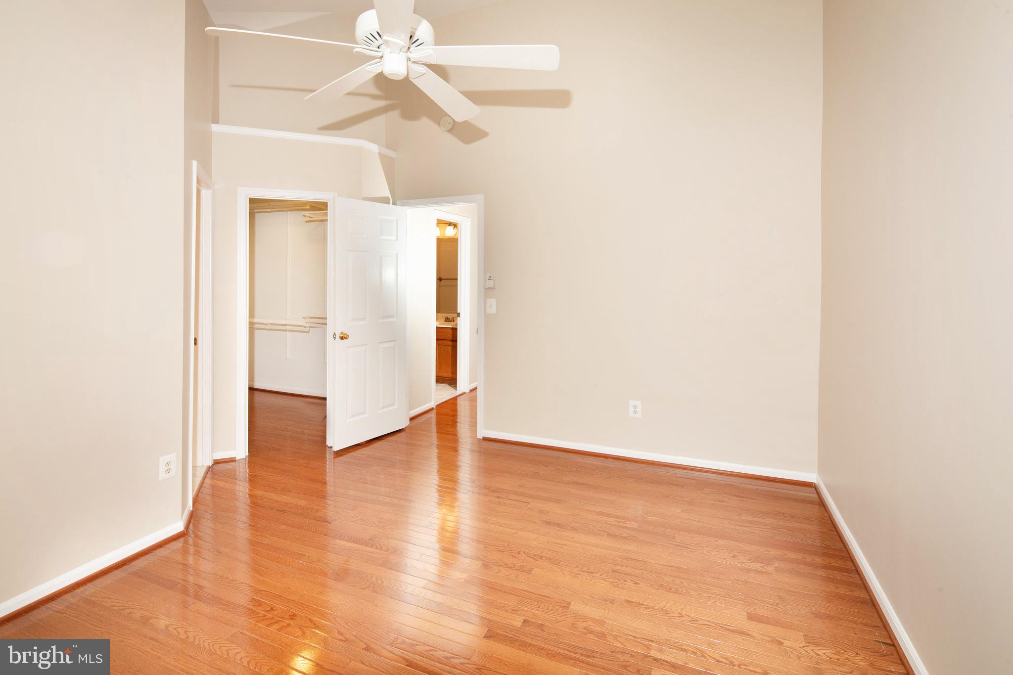 1265 Wild Hawthorn Way Reston, VA 20194 - Photo 32 of 56 Primary Bedroom w/ Wood Floor & Cathedral Ceiling