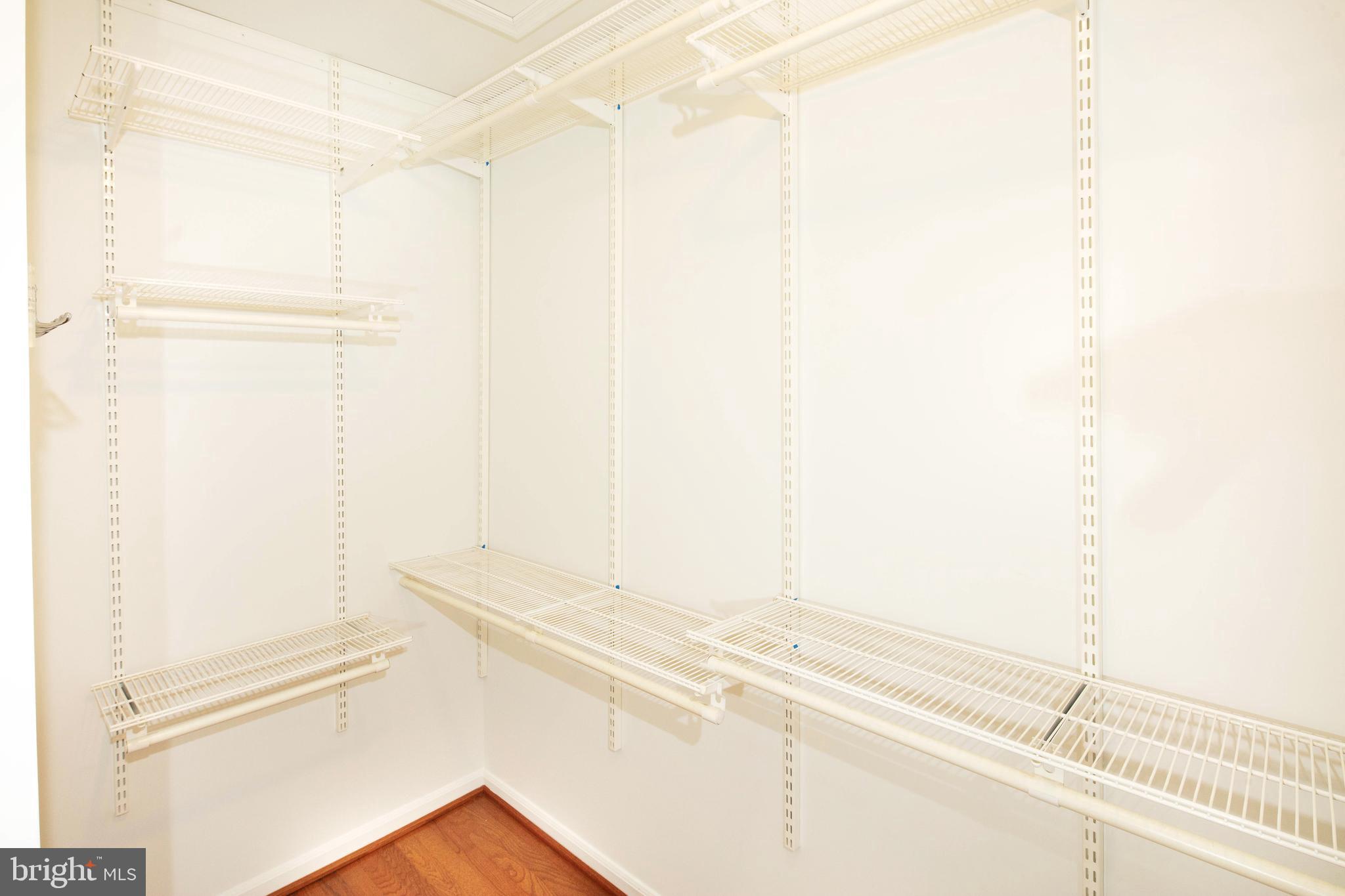 1265 Wild Hawthorn Way Reston, VA 20194 - Photo 33 of 56 Primary Bedroom Closet w/ Built Ins