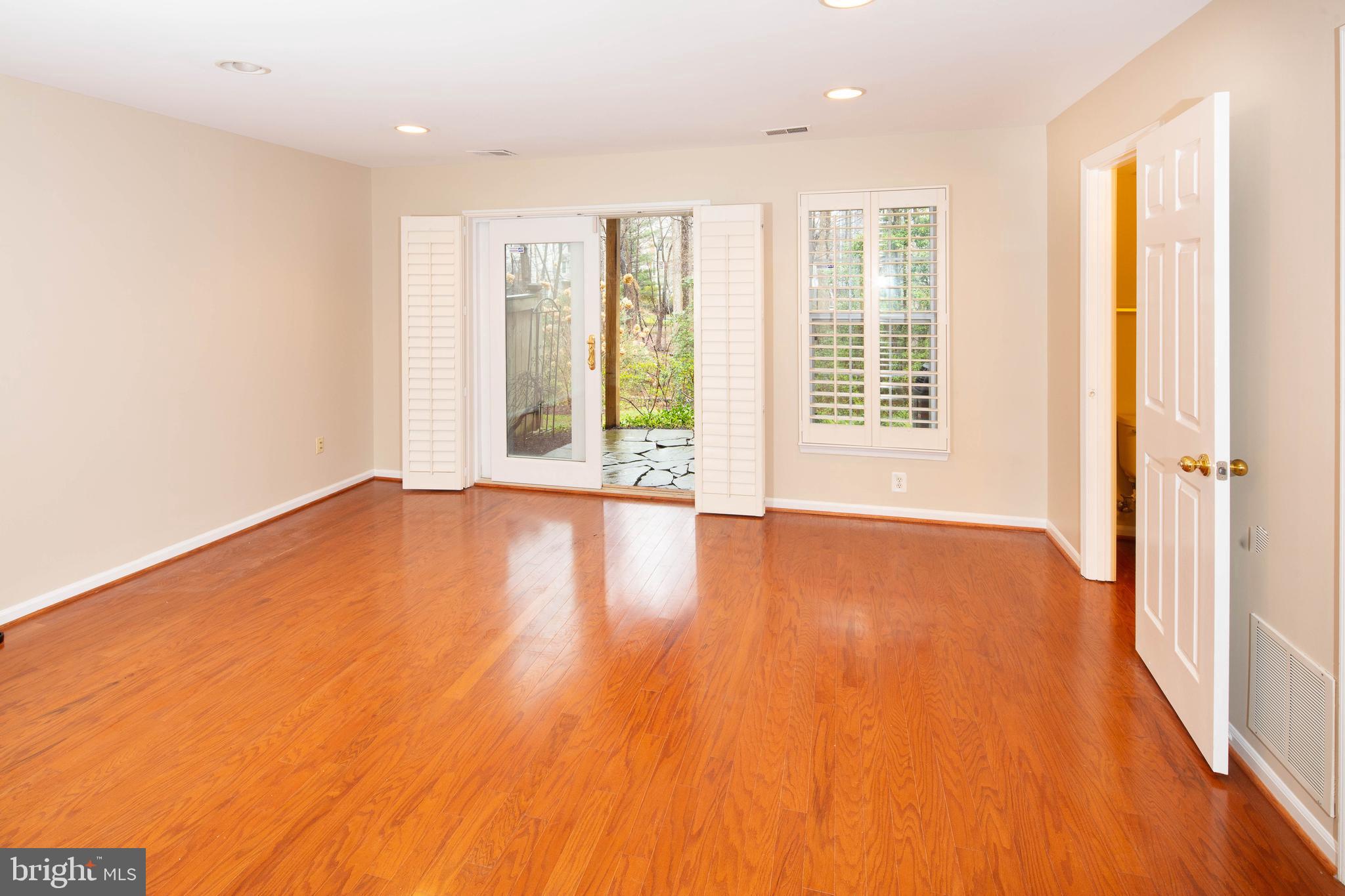 1265 Wild Hawthorn Way Reston, VA 20194 - Photo 45 of 56 Family Room w/ Engineered Wood Flooring