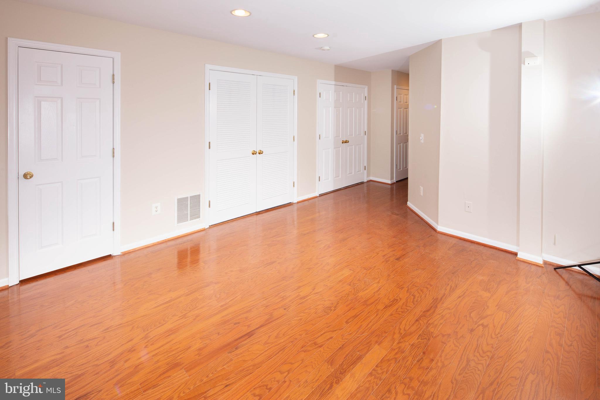 1265 Wild Hawthorn Way Reston, VA 20194 - Photo 46 of 56 Family Room w/ Engineered Wood Flooring