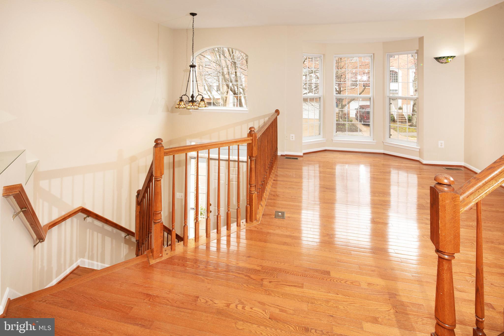 1265 Wild Hawthorn Way Reston, VA 20194 - Photo 8 of 56 Formal Living Room w/ Hardwood Flooring