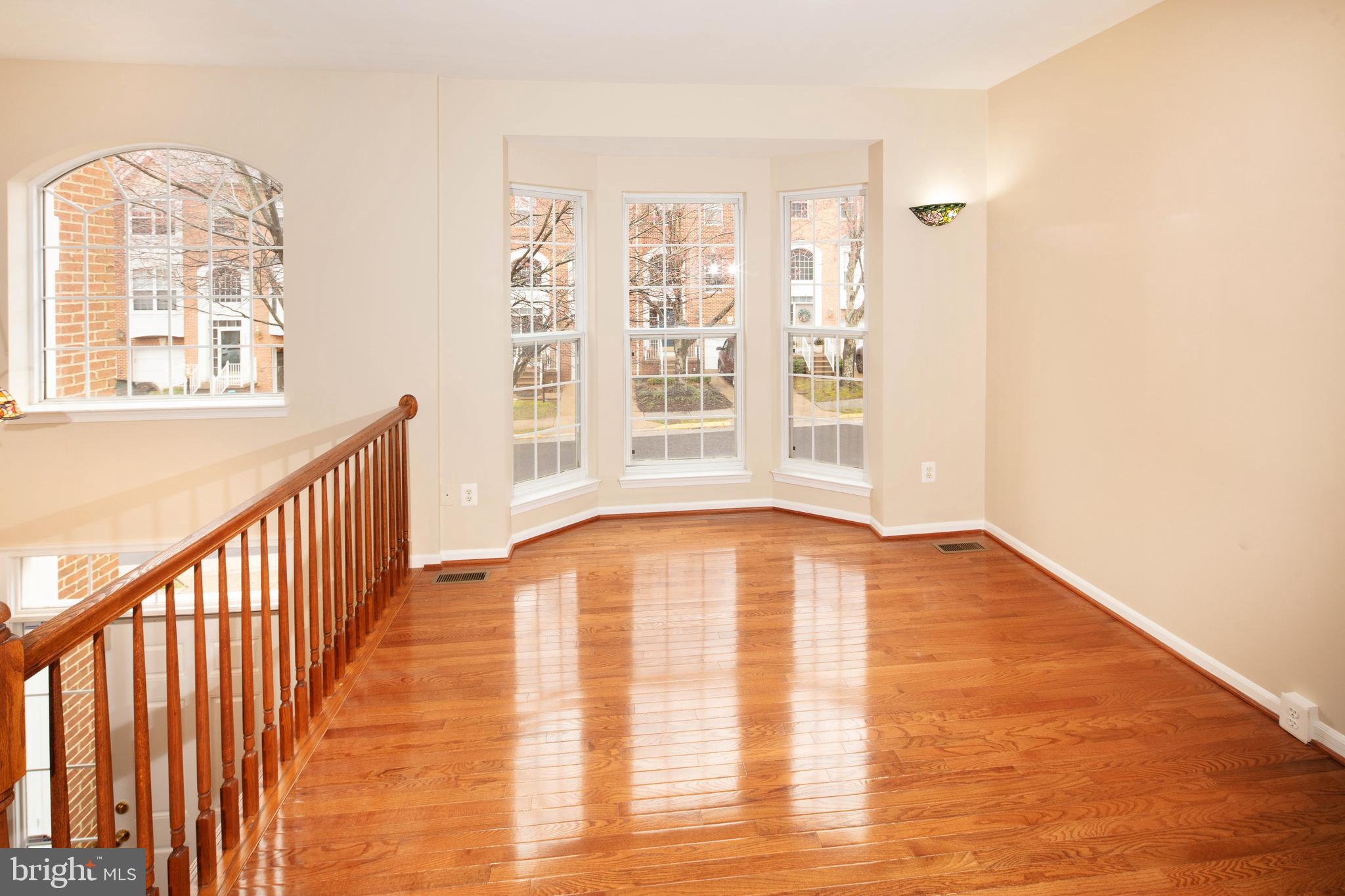 1265 Wild Hawthorn Way Reston, VA 20194 - Photo 9 of 56 Formal Living Room w/ Hardwood Flooring