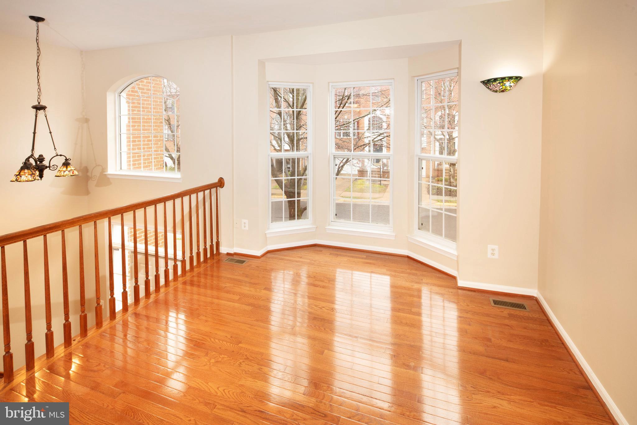 1265 Wild Hawthorn Way Reston, VA 20194 - Photo 10 of 56 Formal Living Room w/ Hardwood Flooring