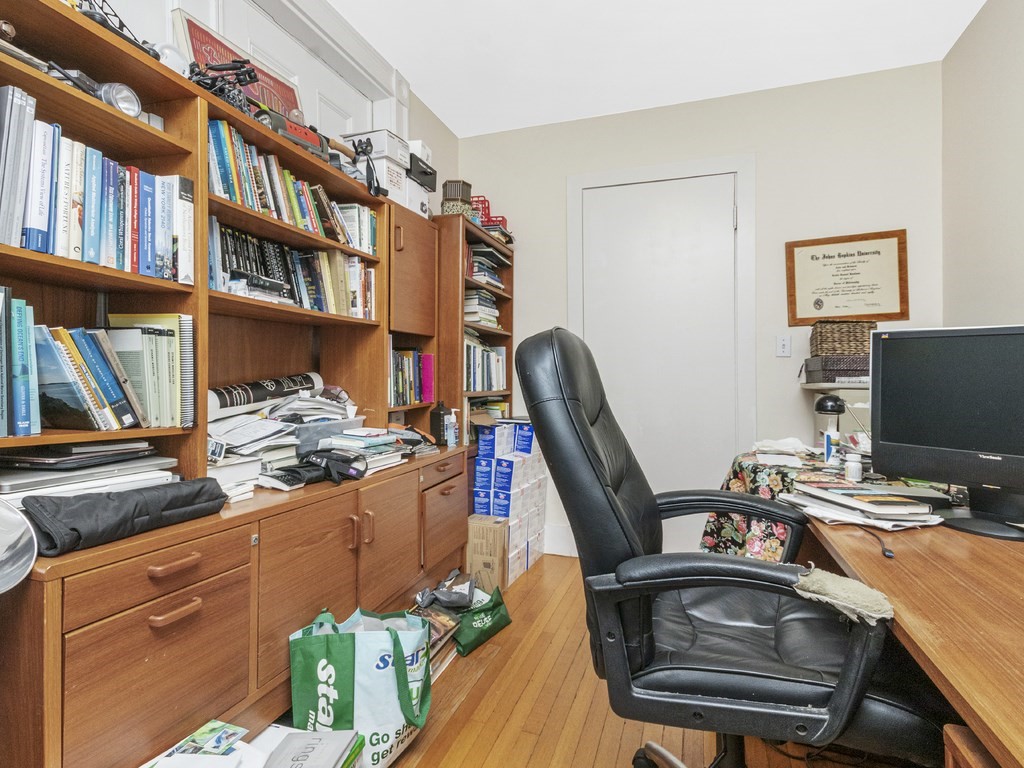 90 Addington Road, Unit 1 Brookline, MA 02445 - Photo 19 of 41 a view of a workspace with furniture and a window