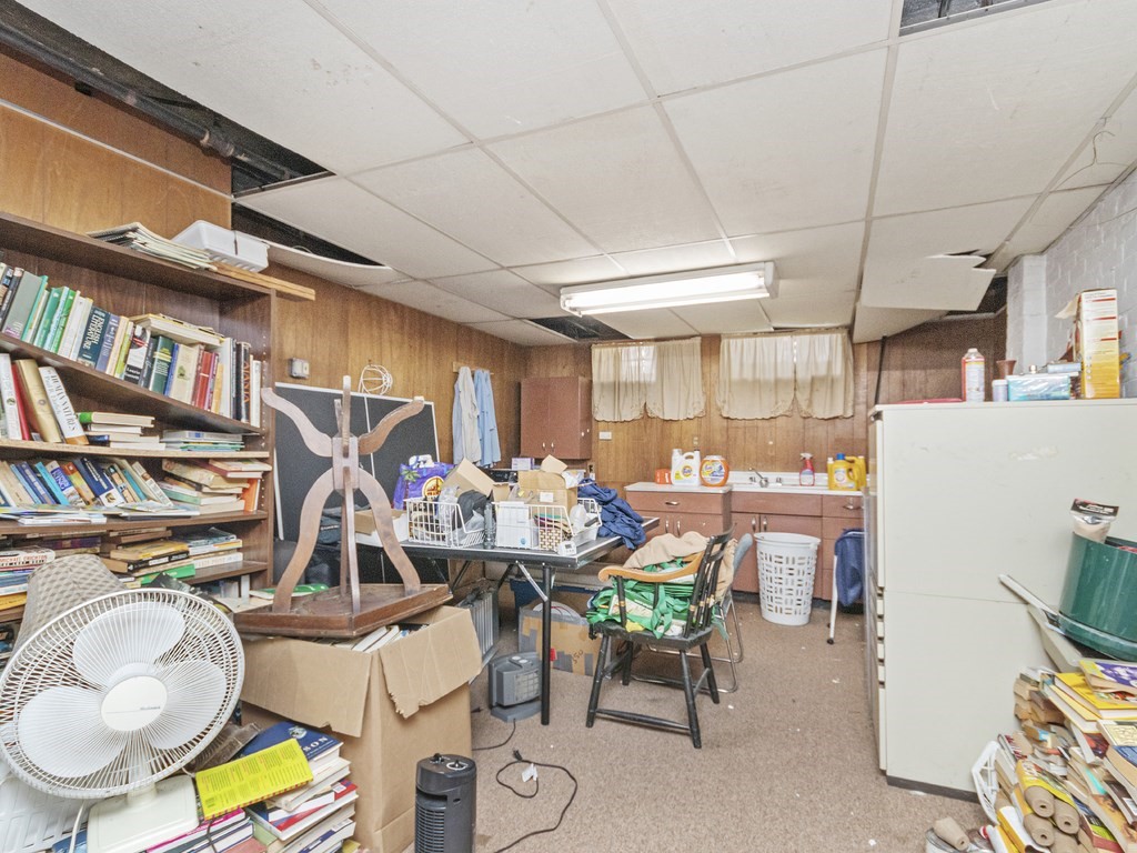 90 Addington Road, Unit 1 Brookline, MA 02445 - Photo 34 of 41 a room with lots of furniture and air hockey table