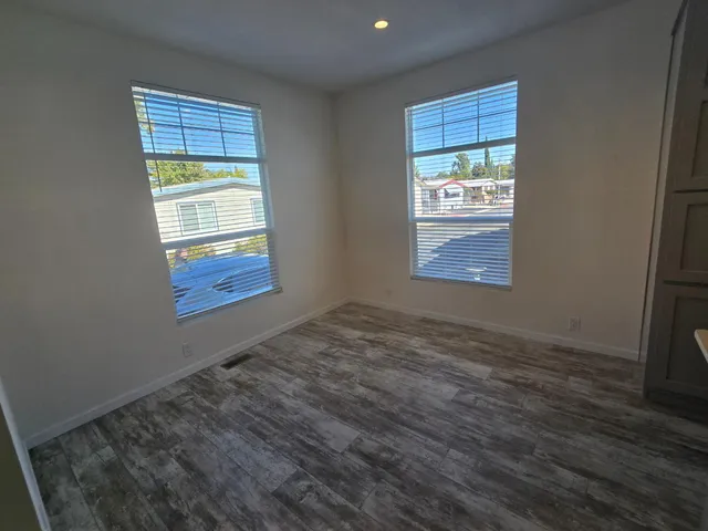 an empty room with windows