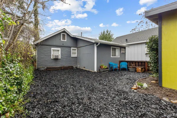 a house view with a backyard space
