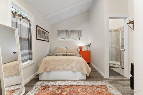 a bed room with a bed and a couch