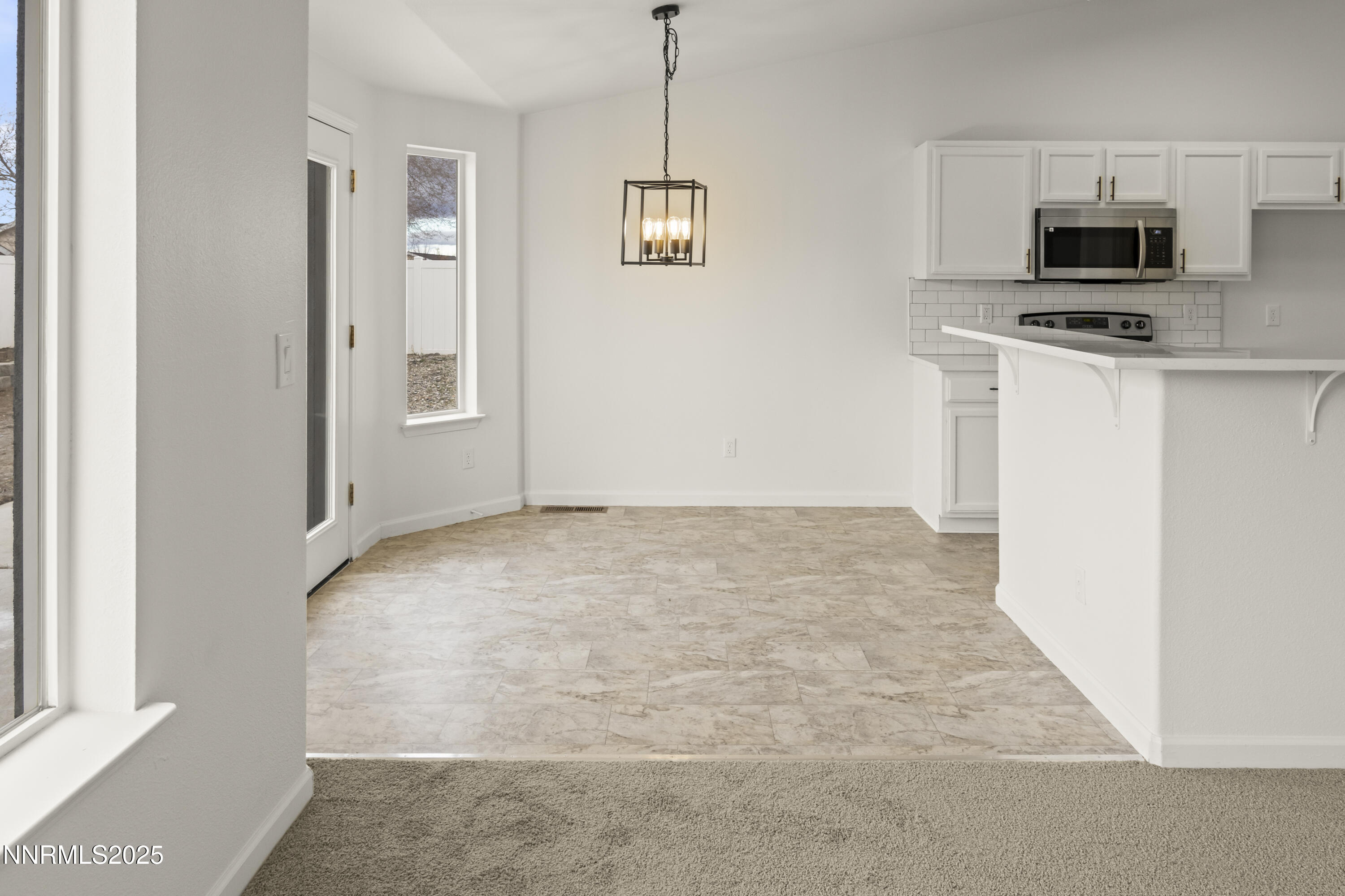 1418 Red Bluffs Way Fernley, NV 89408 - Photo 14 of 35 a view of a kitchen with electric appliances