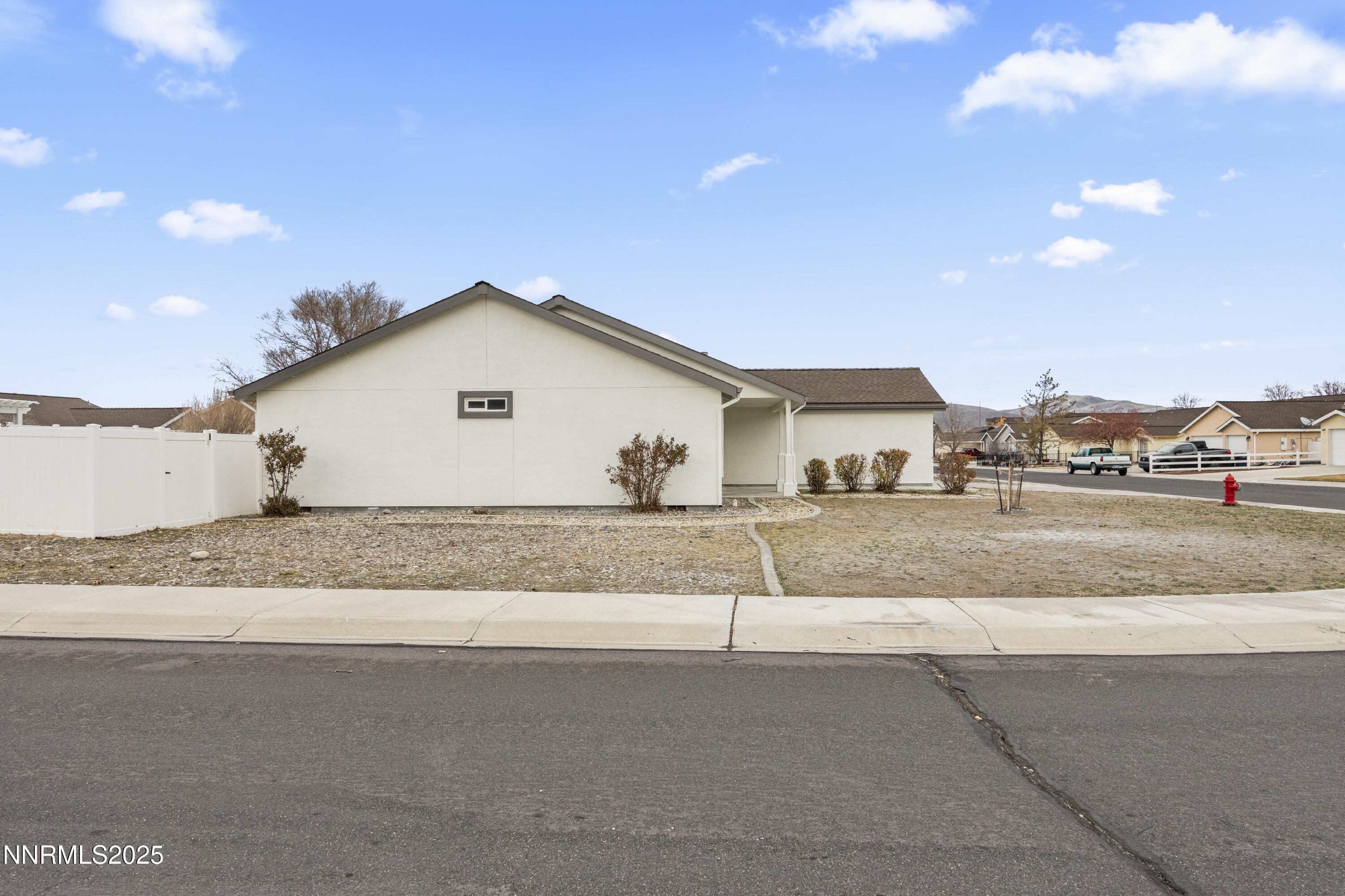 1418 Red Bluffs Way Fernley, NV 89408 - Photo 31 of 35 a view of road and view of the house