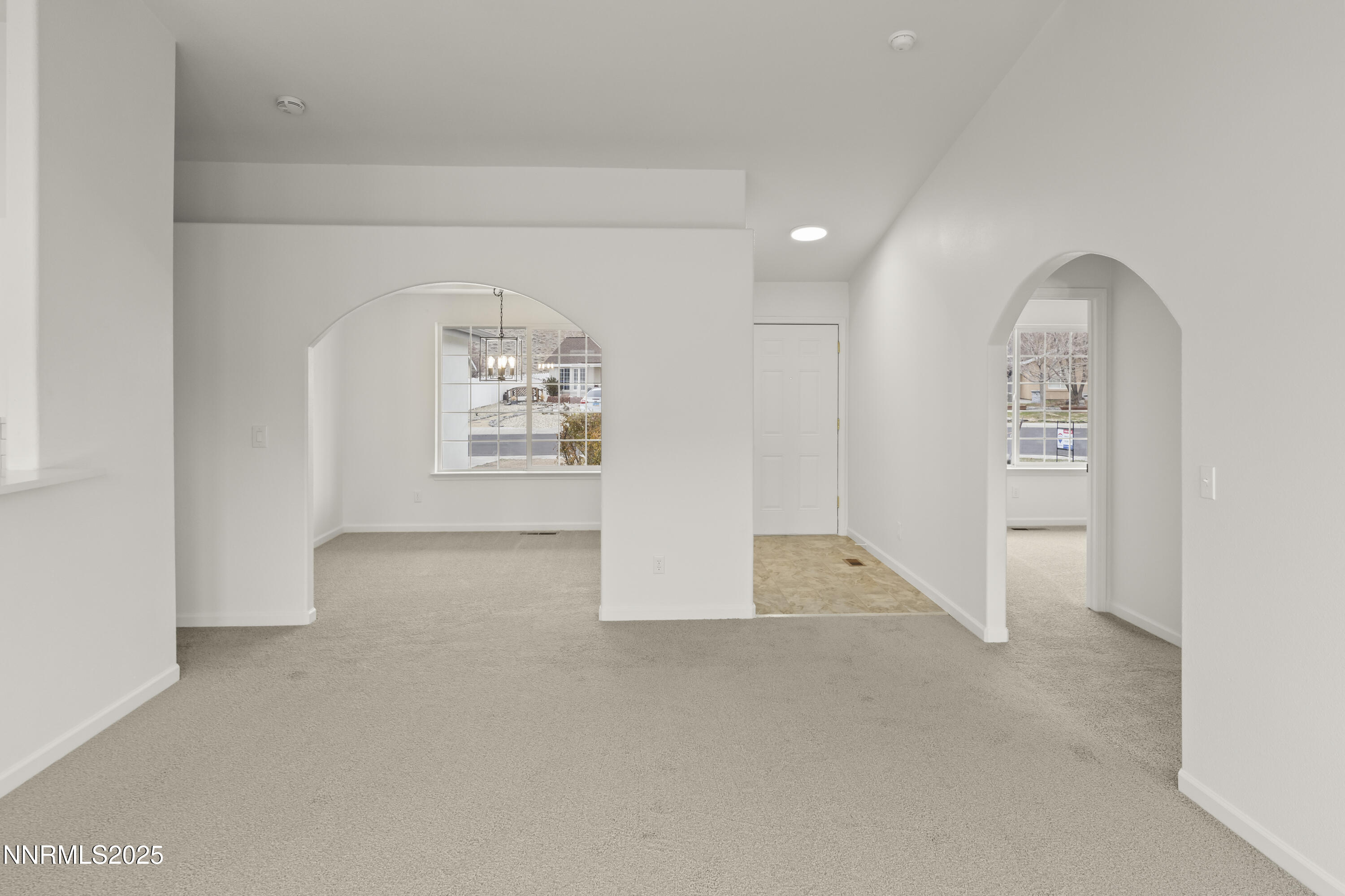 1418 Red Bluffs Way Fernley, NV 89408 - Photo 5 of 35 an empty room with windows and closet