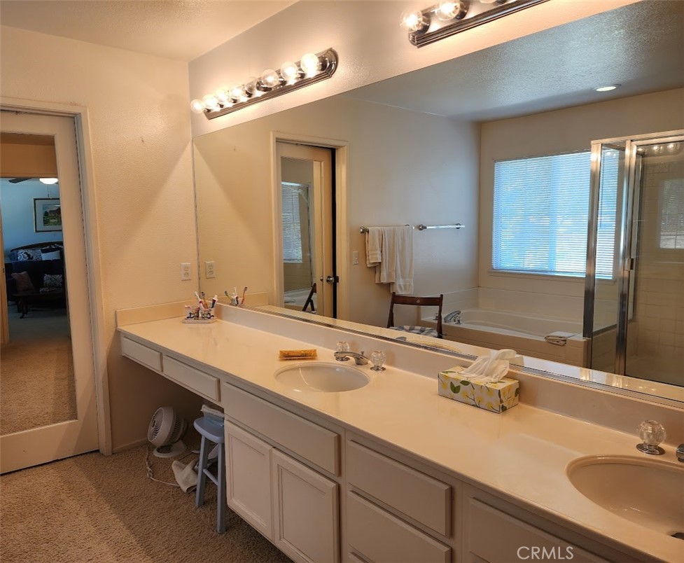 9 Calais Irvine, CA 92602 - Photo 11 of 21 a bathroom with a sink and a mirror
