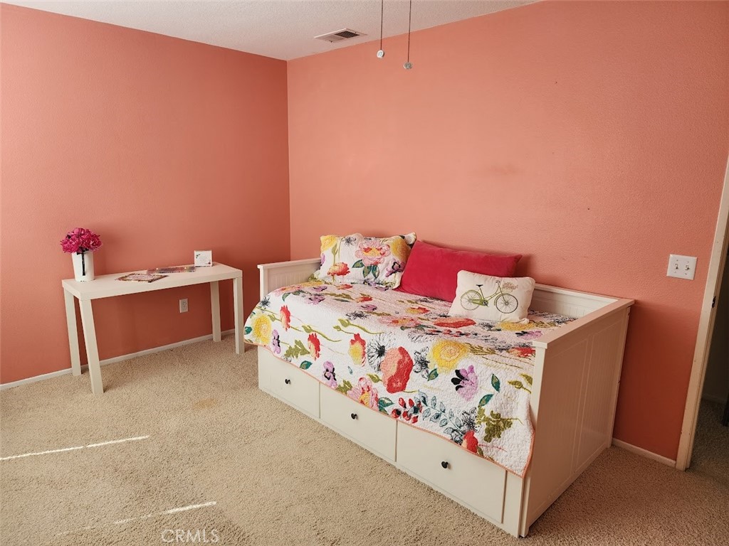9 Calais Irvine, CA 92602 - Photo 12 of 21 a bedroom with a bed and a dresser