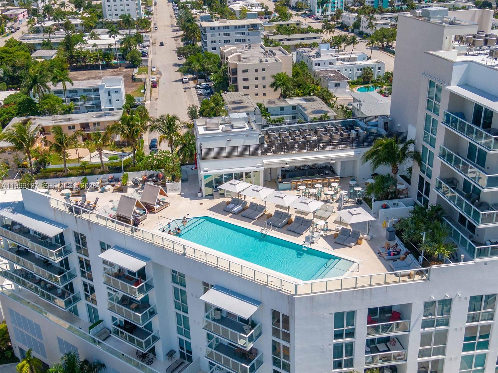401 North Birch Road, Unit 502 Fort Lauderdale, FL 33304 - Photo 28 of 52 an aerial view of a house with a garden and lake view