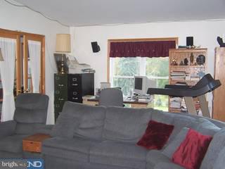1408 Fels Road Quakertown, PA 18951 - Photo 4 of 6 a living room with furniture and a large window