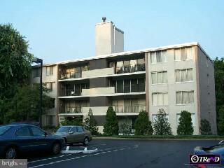 2302 Riddle Avenue, Unit 1B Wilmington, DE 19806 - Photo 1 of 1 a front view of a building with street